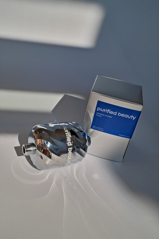 Purified Beauty chrome shower filter with its box